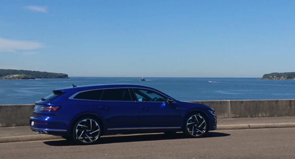 Volkswagen Arteon Shooting Brake side profile with ocean